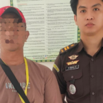 Terdakwa SA saat menghadiri sidang perkara dugaan pelanggaran merek Olympic di Pengadilan Negeri Palangka Raya.